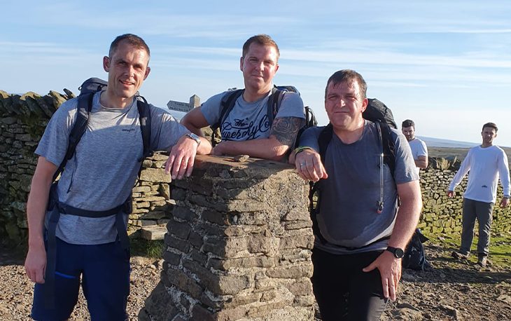 Picture of 3 men, Alex, Craig, and Chris at the top of the three highest peaks in Scotland